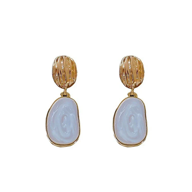 Boucles Ovales™ | Élégance en émail vintage