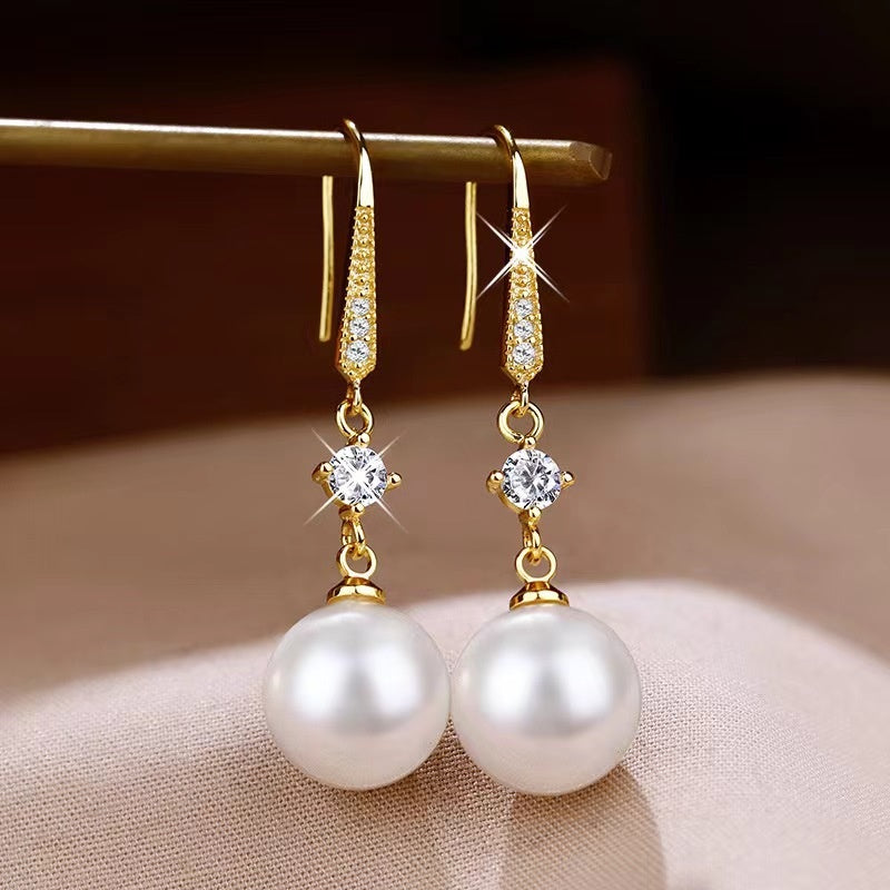 Éclat d'Or™ | Boucles d'oreilles dorées en matière raffinée