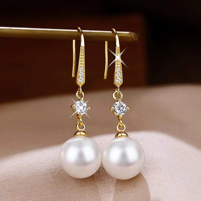 Éclat d'Or™ | Boucles d'oreilles dorées en matière raffinée
