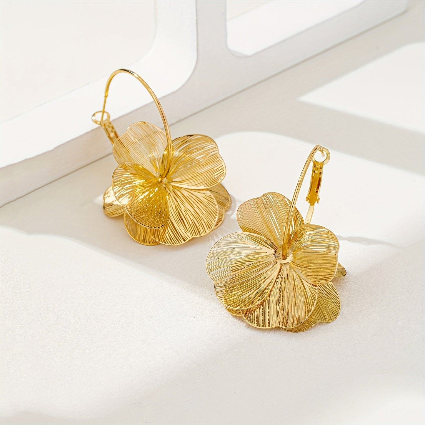 Boucles d'oreilles Exagérées™ | Or creux, élégance raffinée
