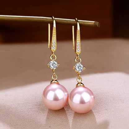 Éclat d'Or™ | Boucles d'oreilles dorées en matière raffinée