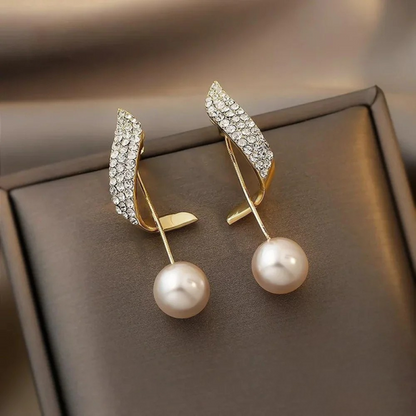 Boucles d'oreilles™ | Élégance en perles dorées