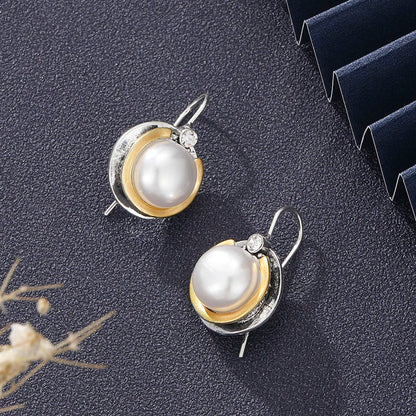 Alba™ | Boucles d’oreilles en acier avec perle