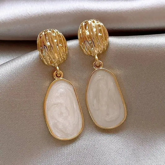 Boucles Ovales™ | Élégance en émail vintage
