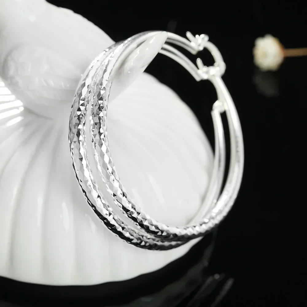 Belmont™ | Boucles d'oreilles créoles en argent