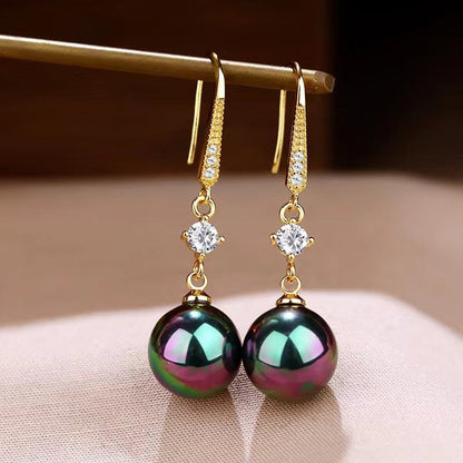 Éclat d'Or™ | Boucles d'oreilles dorées en matière raffinée