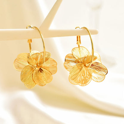 Boucles d'oreilles Exagérées™ | Or creux, élégance raffinée