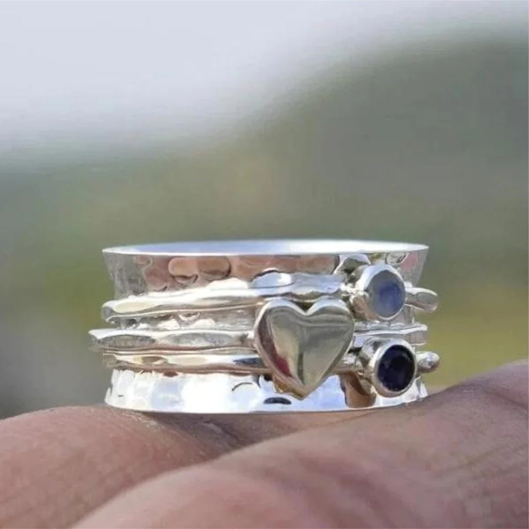 Bague Élégante en Argent avec Cœur Rotatif